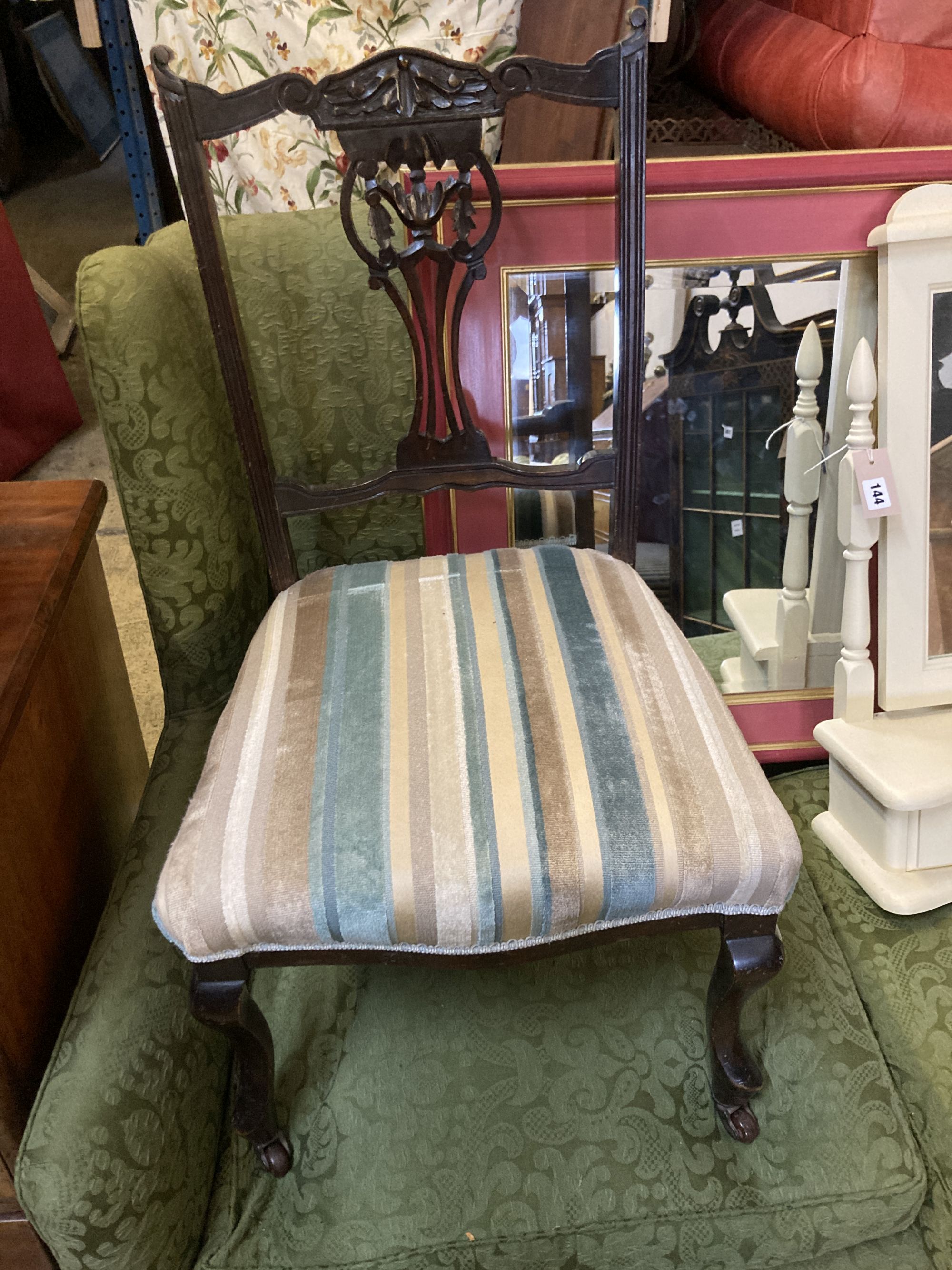A late Victorian mahogany salon chair, a painted toilet mirror and a rectangular wall mirror